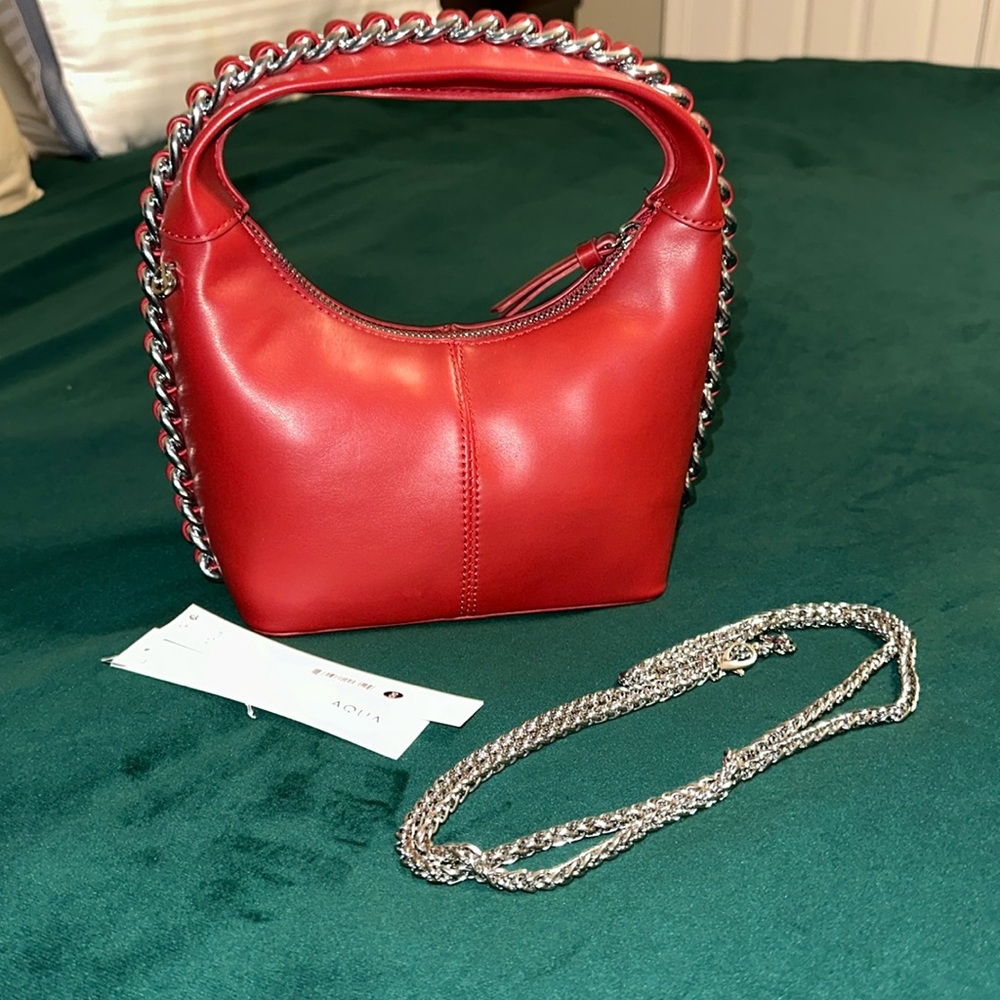Aqua crossbody w/ Silver Hardware. New w/Tags & Stuffing.